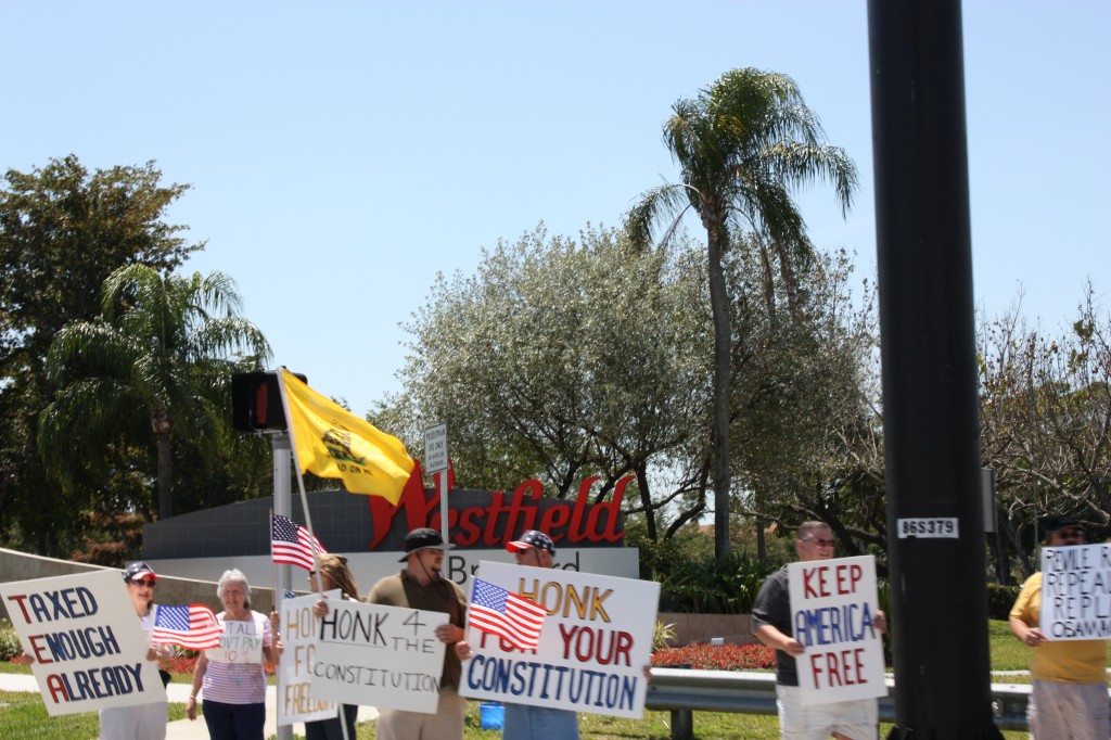 Real-life teabaggers! I wish we had photo-bombed them with a sign that says, "Honk if you're scared of black people." 