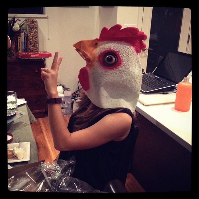 Me on my birthday. Photo courtesy of my friend Chrissy. Chicken head courtesy of my cousin Marco. 