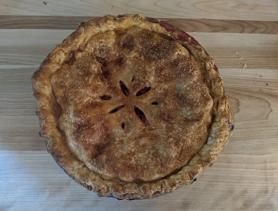 Overhead image of a beautiful golden-crust pie. 